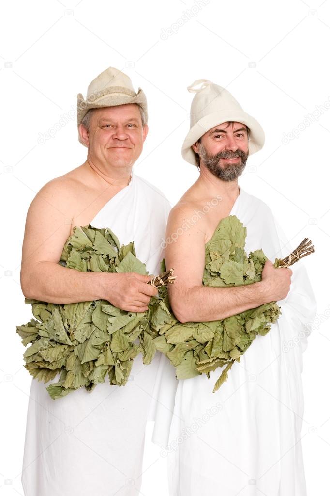 Happy men with oak twigs in bathing costumes