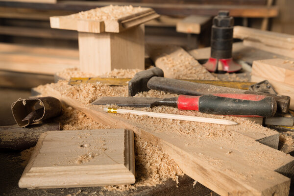 Hammer and chisel on the bench