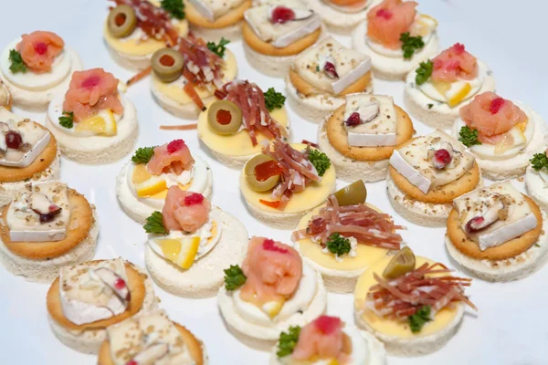 Assorted delicious canapes — Stock Photo, Image