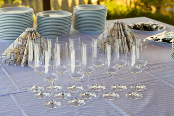 Empty champagne glasses on a table — Stock Photo, Image