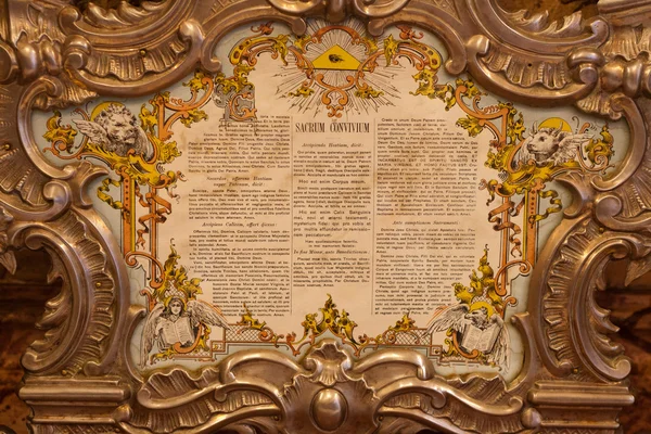 Sacrum Convivium document framed in golden baroque frame — Stock Photo, Image