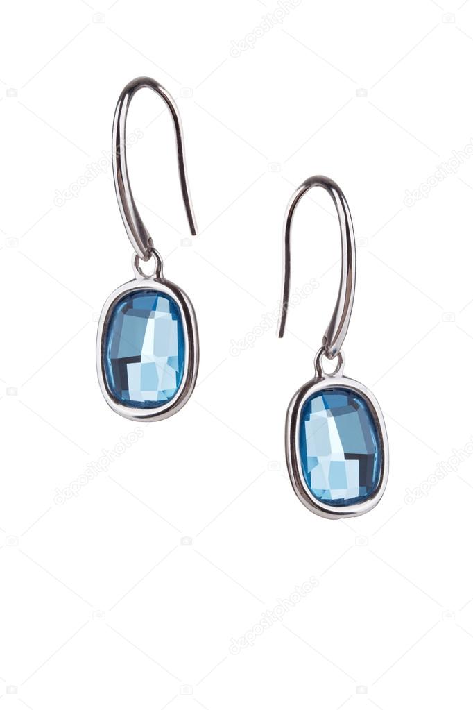 Pair of sapphire earrings isolated on white background 