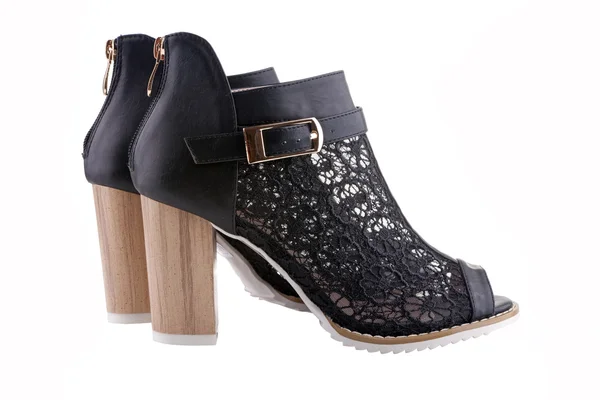 Chaussures femme avec dentelle noire, semelle blanche et talon en bois, isol — Photo