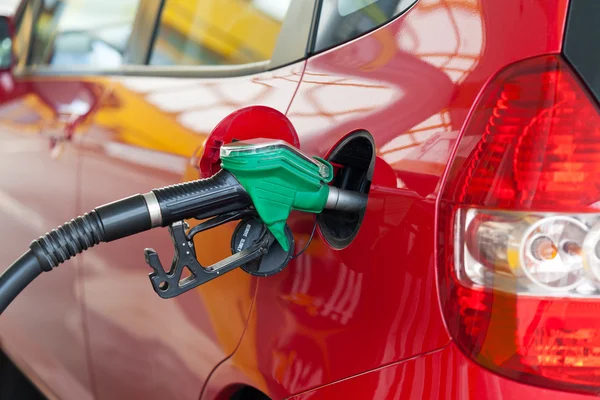 stock image Red car at gas station