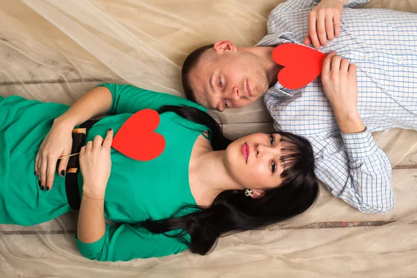 Couple with red heart — Stock Photo, Image