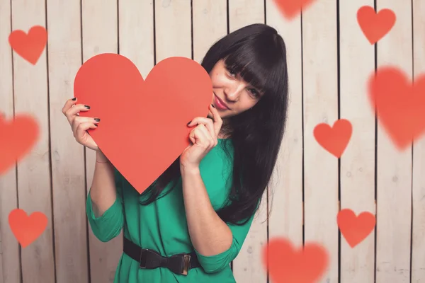 Woman with red heart — Stock Photo, Image