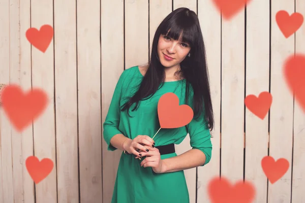 Woman with red heart — Stock Photo, Image