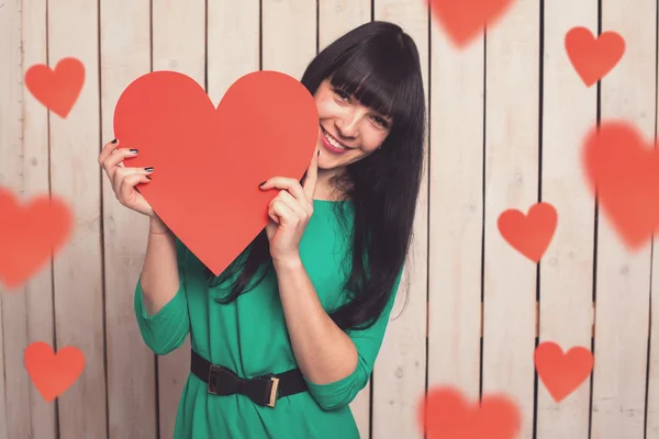 Woman with red heart — Stock Photo, Image