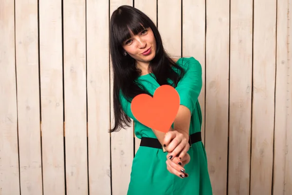 Woman with red heart — Stock Photo, Image