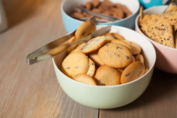 Plates with cookies on table — Stock Photo, Image