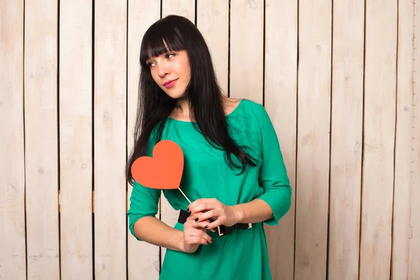 Woman with red heart — Stock Photo, Image