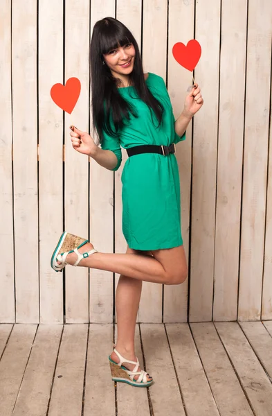 Woman with red heart — Stock Photo, Image