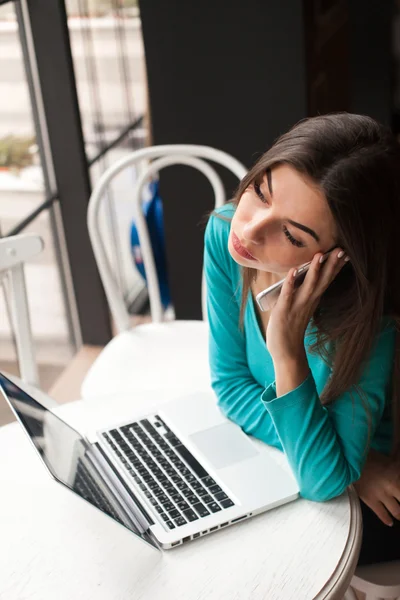 Woman in blue is talking — Stock Photo, Image