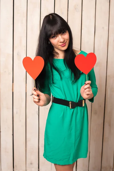 Woman with red heart — Stock Photo, Image