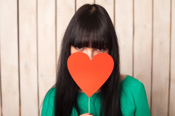 Woman with red heart — Stock Photo, Image