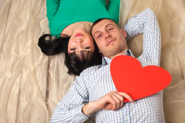 Couple with red heart — Stock Photo, Image