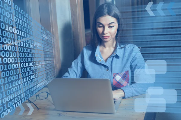 Woman ana laptop at the table — Stock Photo, Image