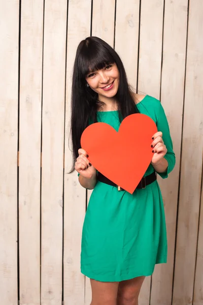 Woman with red heart — Stock Photo, Image