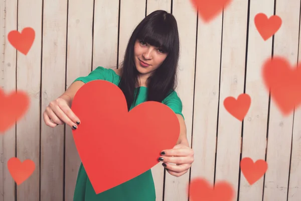 Woman with red heart — Stock Photo, Image