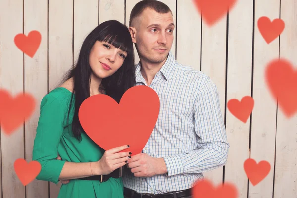 Couple with red heart — Stock Photo, Image