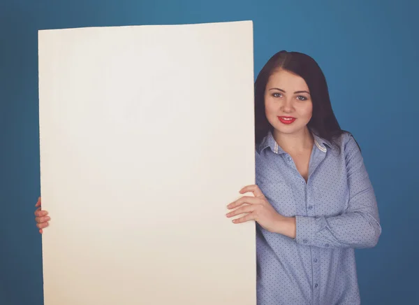 Vrouw in blauw en canvas — Stockfoto