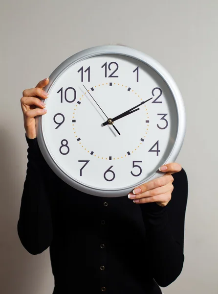 Woman with clock — Stock Photo, Image