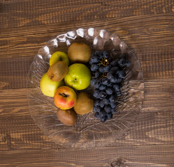 Dish of fruits are on a table — Stock Photo, Image