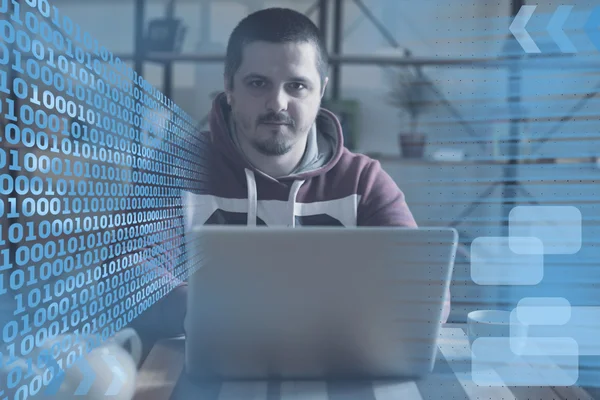 Cup, laptop and man with hood — Stock Photo, Image