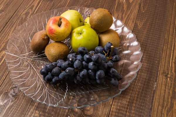 Heathful fruits are in dish — Stock Photo, Image