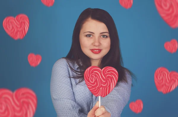 Candy and woman in blue — Stock Photo, Image
