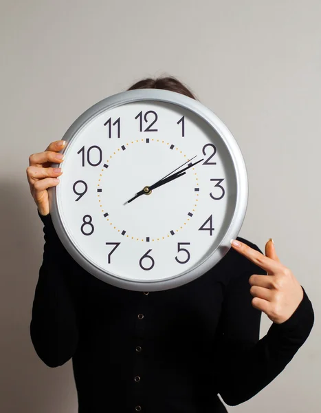 Woman with clock — Stock Photo, Image