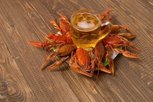 Crayfishes and beer mug on the plate — Stock Photo, Image