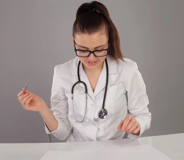 Nurse in medical stethoscope — Stock Photo, Image