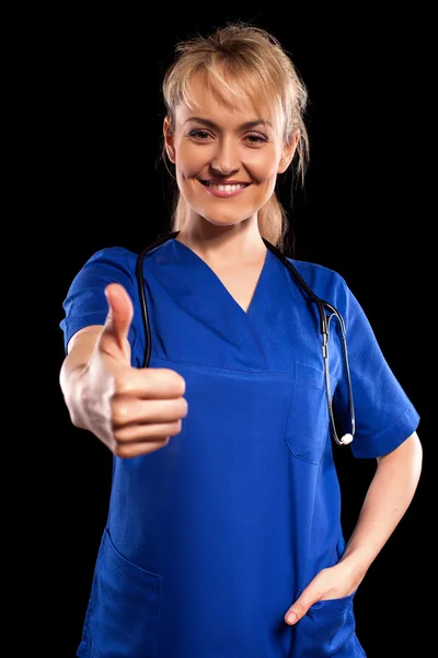 Doctor showing thumb up sign — Stock Photo, Image