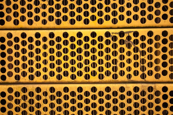 Yellow metal mesh — Stock Photo, Image