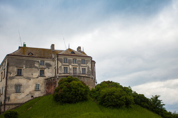 Old castle surrounded with summer nature