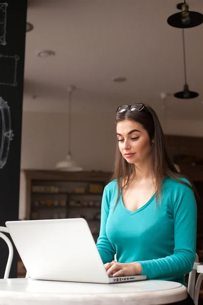 Frelancer with glasses in blue — Stock Photo, Image