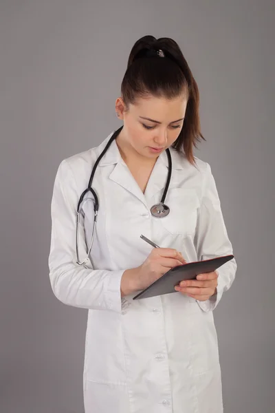 Nurse is noting — Stock Photo, Image