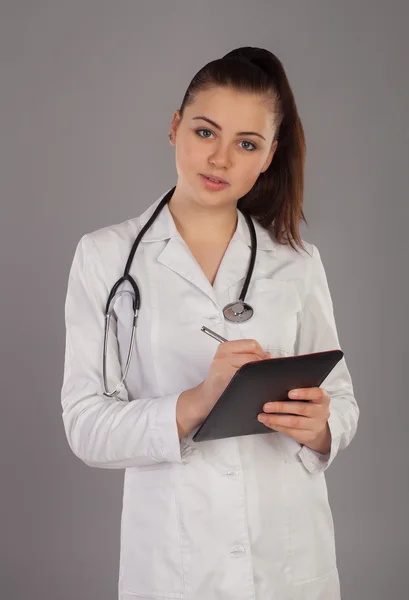 Nurse is noting — Stock Photo, Image