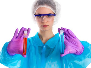 Woman holds two tubes