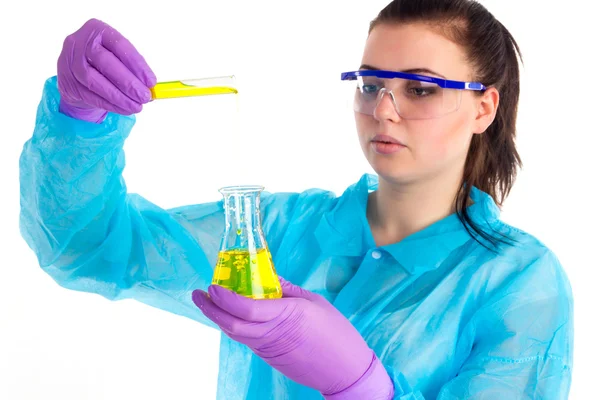 The woman transfuses different liquids — Stock Photo, Image