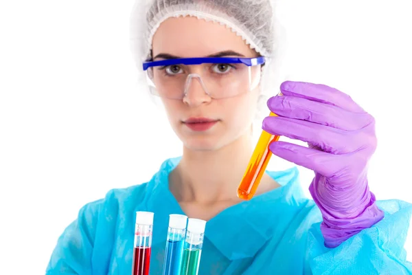 A lot od tubes in a woman's hands — Stock Photo, Image