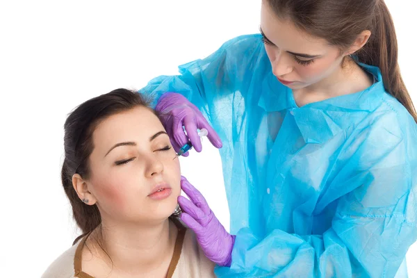 Doctor injects a botox — Stock Photo, Image