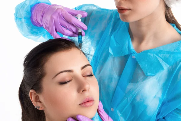 Doctor injects a botox — Stock Photo, Image