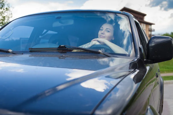 The woman in a car — Stock Photo, Image