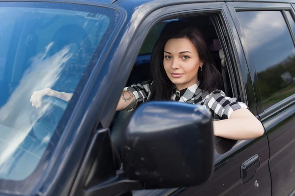 The woman in a car — Stock Photo, Image