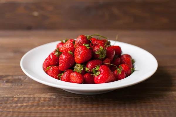 Strawberries on the plate — Stock Photo, Image