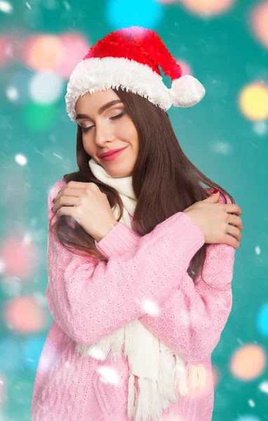 Girl in sweater and christmas hat — Stock Photo, Image