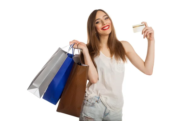 Smiling model showing credit card — Stock Photo, Image