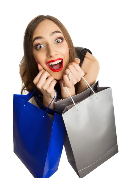 Modello stupito con shopping bags — Foto Stock